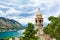 View of Kotor city, Church of Our Lady of Remedy, mediterranean sea and mountain landscape in Bay of Kotor, Montenegr