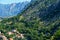 view of the Kotor city and mountains, Montenegro, medieval European architecture, city streets, red tiled roofs