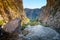 View of Kourtaliotis river and canyon near Preveli beach at Libyan sea, river and palm forest, southern Crete.