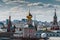 View of the Kremlin\'s Spassky Tower, and St. Basil\'s Cathedral of the morning with cumulus clouds