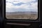 View of the Kumtag Desert in the Gansu Province from the window of a train