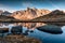 View of Lac Long with massif Des Cerces reflection on the lake in Claree valley at France