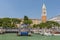 View of the lagoon with Campanile on Piazza di San Marco and water bus  vaporetto  stop, Venice, Italy