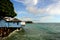 A view of Lahaina boat harbor in the distance from restaurant row in downtown Lahaina, Maui, Hawaii.