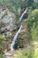 view on lainbach waterfall in summertime near mittenwald, bavaria, germany