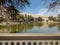 View of lake at huacachina Oasis palm trees around the water