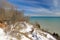 The view of Lake Michigan on a Winter day from atop a bluff.