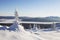 View of lake with mountain range Zyuratkul, winter landscape. Sp