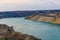 View of lake with sandy shores in flooded sand quarry