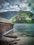 View on lake and wooden house in Hallstatt. Salzkammergut region in Austria