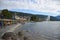 View of the lakeshore boardwalk of Lake Zug with people