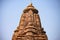 View of Lakshmana Temple spire in Khajuraho, India