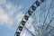 The view landmark before a summer sunset - touristic wheel with amazing view over the city