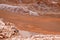 View of the landscape of the Atacama Desert. The rocks of the Mars Valley Valle de Marte and Cordillera de la Sal, Atacama
