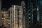 View landscape and cityscape with high building in night time in Hong Kong, China