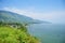 View landscape Danau Toba Lake and Tao Batak Toba Caldera Supervolcano at tomok village hill and Sipiso Piso mountains in