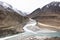 View landscape himalayas range mountain with Confluence of the Indus and Zanskar Rivers from on Srinagar highway while winter