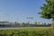 View of landscape with metal fence and three swedish flags. Beautiful landmarks background.