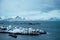 View of a landscape of a Norwegian fjord with a snowy mountain and rocks, Lofoten Islands