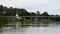 View landscape with pagoda chedi of wat muang temple and bridge crossing river