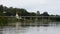 View landscape with pagoda chedi of wat muang temple and bridge crossing river