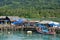 View landscape seascape and fishing boat ship floating in water sea waiting catch fish and marine life in ocean at fishing village