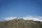 View landscape of Thiksey monastery and Namgyal Tsemo Gompa from Khardung La Road in Himalaya mountain in Jammu and Kashmir, India