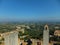 View of landscape in Tuscany, Italy, disappearing into the distance, taken from top of Torre Grossa in San Gimignano