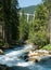 View of the Langwies Viaduct in the mountains of Switzerland near Arosa and a river below