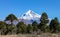 View of the Lanin Volcano from the road to Tromen Lake in Neuquen, Argentina. This volcano is covered by eternal snow