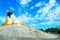 View of large Buddha statue in the sleeping posture with sky view at Phan temple,Chiang rai,Thailand