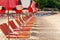 View of a large number of empty sun loungers and parasols on the beach on a sunny day. World isolation. No people