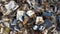 A view of a large pile of scrap metal at a junkyard or recycling plant