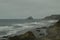 View Of A Large Rock On Los Quebrantos Beach On A Rain Day. July 30, 2015. Landscapes, Nature, Travel. San Juan De La Arena,