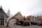 View of the large Wat Mahathat Worawihan complex from the main entrance, one of the most revered Buddhist temples in Phetchaburi