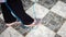 View from leg of a woman using the jump rope to exercise at home