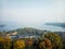 View from Leifeng Pagoda Hangzhou West Lake autumn scenery .mountain range at sunrise sunset orange sky beautiful landscape .