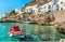 View of Levanzo Island with Fisherman boat in foreground, is the smallest of the three Aegadian islands in the Mediterranean sea o