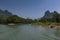 View of the Li River with the tall limestone peaks on the background near Yangshuo, China, Asia