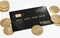 View of Libra gold-black credit card lying on a white background with golden libra coins