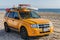 View of lifeguard yellow truck on California beach.
