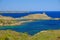 View on the light house Cape Favaritx and the old watch tower Es Colomar in Es Grau on Menorca