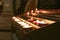 The view of lighted tealight candles. Burning candles