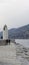 View of the lighthouse of city of Camogli, Genoa Province, Liguria, Mediterranean coast, Italy