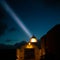 View of the lighthouse and cliffs at Cape St. Vincent in Portugal at night.