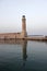 View of the lighthouse in the Old Venetian Harbor of Rethymnon.