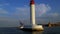 A view of the lighthouse on the part of the ship that sails into the harbor