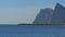 View of the Lighthouse by the Sea near the Rock of Gibraltar. Spain.