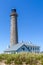 View of the lighthouse of Skagen and sand dunes with grasses in the foreground