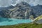 View of the Limmernsee dam in the canton of Glarus. Hiking high above the mountain lake in the Alps. Glarus, Switzerland